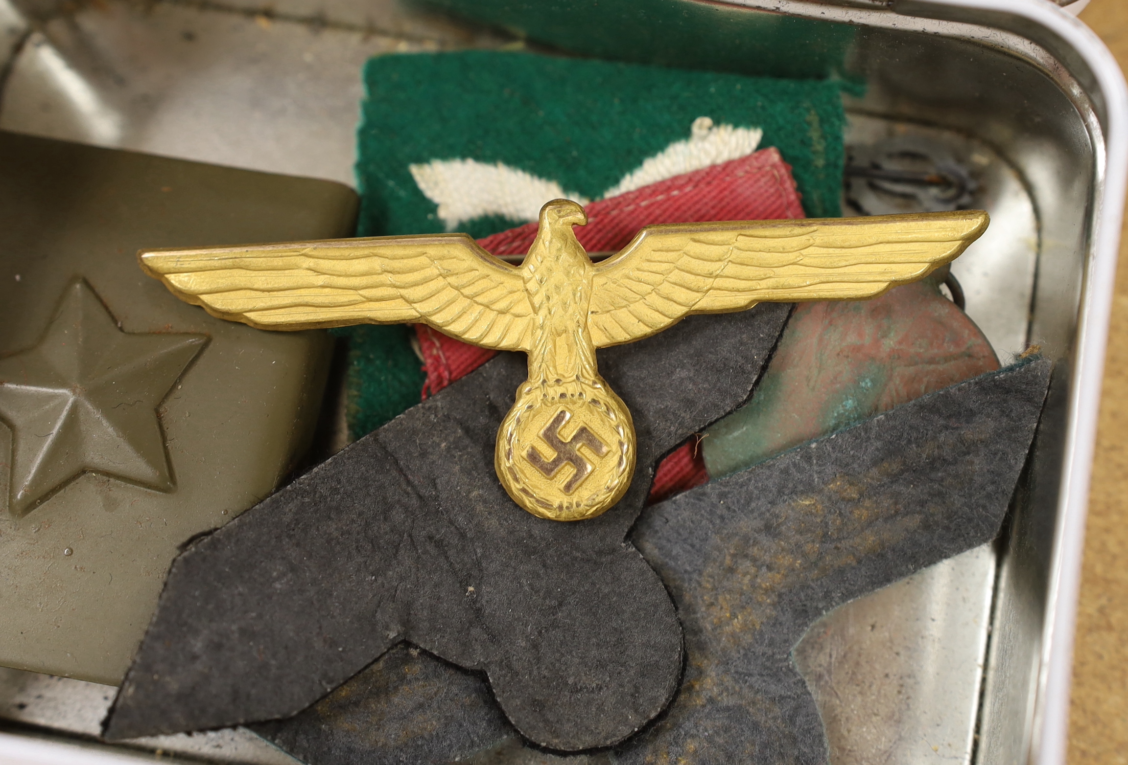 A collection of mainly WWII German military badges